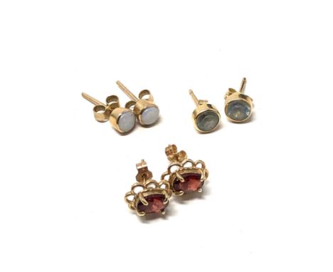 3 x 9ct gold paired gemstone stud earrings inc. topaz, garnet &amp; opal (2.3g)