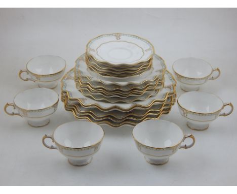 A Royal Crown Derby porcelain Lombardy pattern 24 piece tea service comprising 6 sandwich plates, 6 side plates and 6 teacups