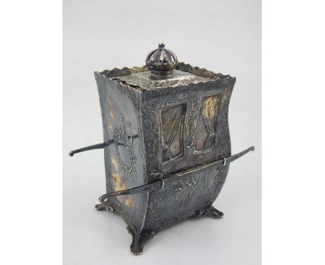 A late 19th century German silver box and cover modelled as a sedan chair, with pierced crown finial over an embossed body de