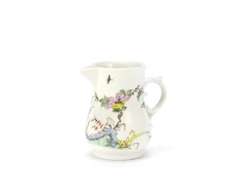 A Worcester creamjug, circa 1753Of pear shape with a sparrow beak spout and double scrolled handle, painted in a light famill
