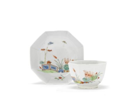 A Worcester teabowl and saucer, circa 1753-54Of octagonal form, painted in a bright palette with bamboo growing behind a two-