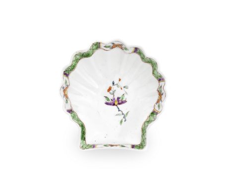 A Worcester scallop shell pickle dish, circa 1753-54Of unusually large size and scallop shell form, painted in the centre wit