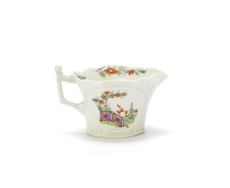 A Worcester creamboat, circa 1753-55Of corrugated oval form with a flared and lobed rim, the angular handle with a scrolled t