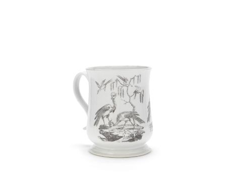 A rare large Worcester mug, circa 1754Of 'Scratch Cross' type, bell-shaped on a wide foot with a grooved strap handle, transf