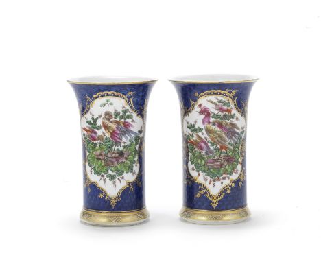 A rare pair of Bow 'scale blue' vases, circa 1770Of beaker form with gently everted rims, painted on both sides with panels o