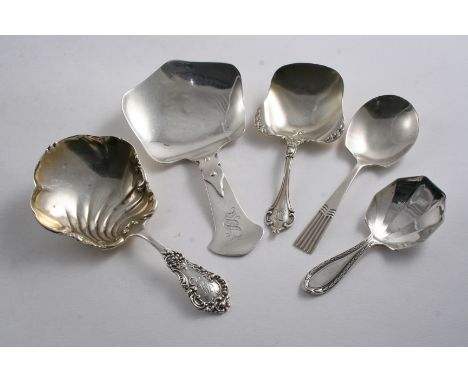 A LARGE AMERICAN CADDY SPOON initialled "S", 1910-20, a decorative American caddy spoon by Gorham & Co., & another slightly l