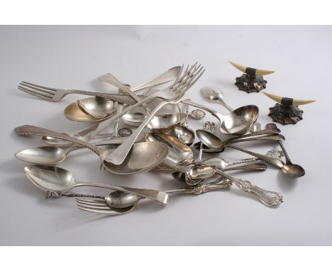 A MIXED LOT: Two George III table forks, initialled, a Fiddle sauce ladle, crested, a Bead pattern sauce ladle, monogrammed, 
