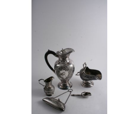 A MIXED LOT: A late Victorian cream jug, a modern engine-turned purse, a plated hot water jug & a plated sugar scuttle & scoo