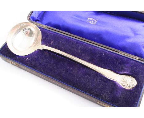 A VICTORIAN KING'S HUSK PATTERN SOUP LADLE  (contained in a fitted box), by George Adams, London 1845;  13.5"  (34.2 cms) lon