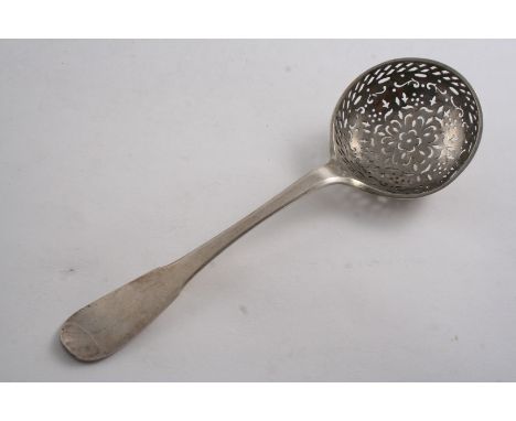 AN EARLY 19TH CENTURY CONTINENTAL SUGAR SIFTER LADLE with a shallow circular bowl, struck with two marks, an indistinct maker