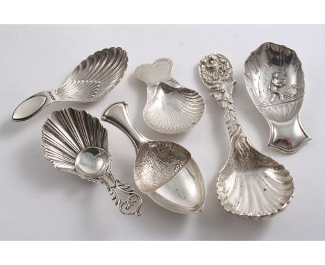 SIX VARIOUS CADDY SPOONS All by T. Bradbury & Sons of Sheffield, mixed dates 1903-1938;  the longest one 4.8"  (12.2 cms) lon