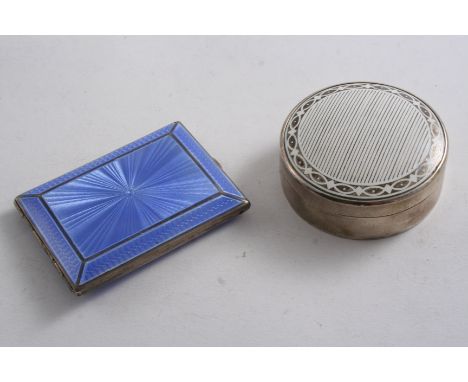 A BOOK MATCH HOLDER enamelled in translucent light blue over an engine-turned ground, maker's mark "H.C.D", Birmingham 1928 a