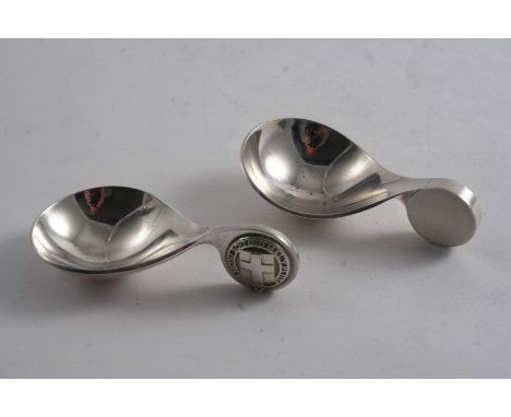 TWO CONTEMPORARY CADDY SPOONS by Garrard & Co; one with the Royal strap & buckle motto on the handle (No.32 of 500), London 1