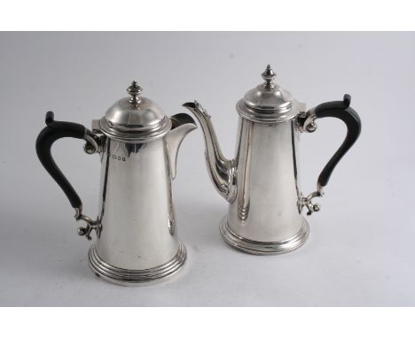 A MODERN TAPERING COFFEE POT with a domes cover & knop finial, by Harrison Bros & Howson, Sheffield 1925 and a hot water jug 