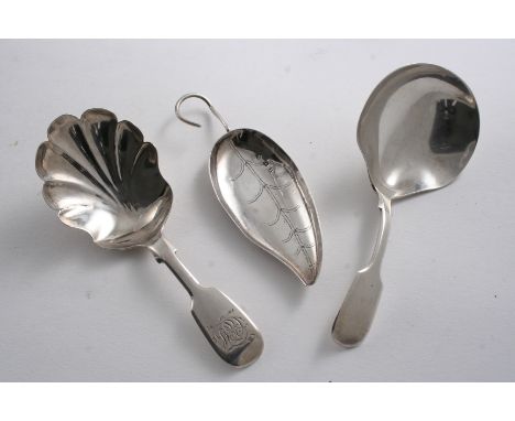 THREE EXETER-MADE CADDY SPOONS: A Fiddle example with a fluted bowl, initialled, by J. Ferris, 1852, a Fiddle example with a 
