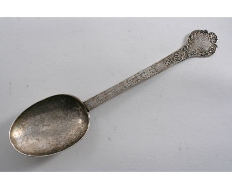 A RARE, LATE CHARLES II "FROST FAIR" SOUVENIR LACEBACK TREFID SPOON, scratched with the initials "EW" on the terminal & inscr