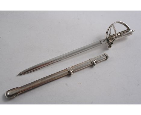 A LATE VICTORIAN NOVELTY PAPER KNIFE in the form of a miniature, Cavalry Officer's sword, complete with scabbard, by Sampson 