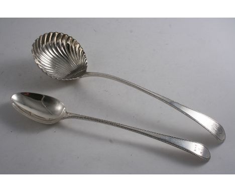 A GEORGE III OLD ENGLISH BEAD PATTERN SOUP LADLE with a swirl-fluted bowl, initialled, possibly by either James Stamp or John