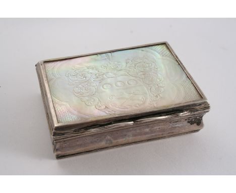 A 19TH CENTURY SWEDISH SNUFF BOX oblong with an inset mother of pearl plaque on the cover, engraved with a coat of arms, gilt