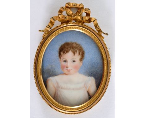 ENGLISH SCHOOL MID 19TH CENTURY A miniature portrait of a child with auburn hair, half length on ivory, 5.5 x 4.5 cms, in gil