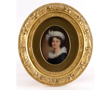 A GERMAN OVAL PORCELAIN PLAQUE painted with a portrait of Mme Vigee Le Brun, head & shoulders,16 x 12 cms, inscribed on backi