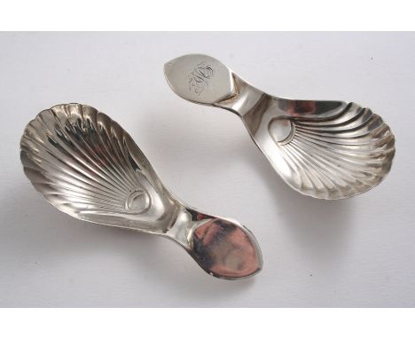 DOUBLE DUTY MARK: A rare George III caddy spoon with a fluted bowl, by Richard Morton & Co., Sheffield 1797 and another simil