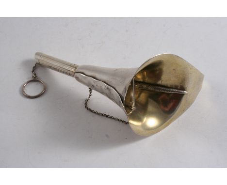 A VICTORIAN PARCELGILT POSY HOLDER in the form of an Arum lily flower (Zantedeschia Aetheopica), the stalk with three fold-ou