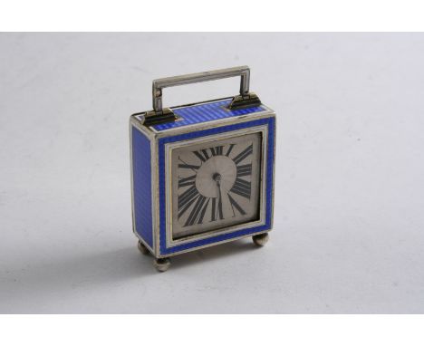 A FRENCH ART DECO BOUDOIR OR MINIATURE CARRIAGE TIMEPIECE square, decorated with translucent blue enamel over an engine-turne