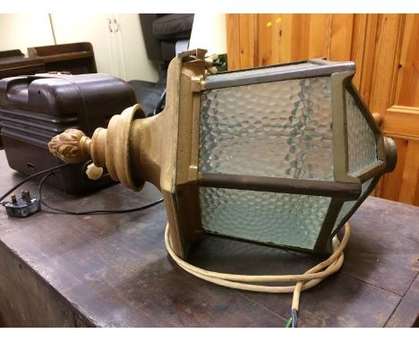 A brass hanging lamp