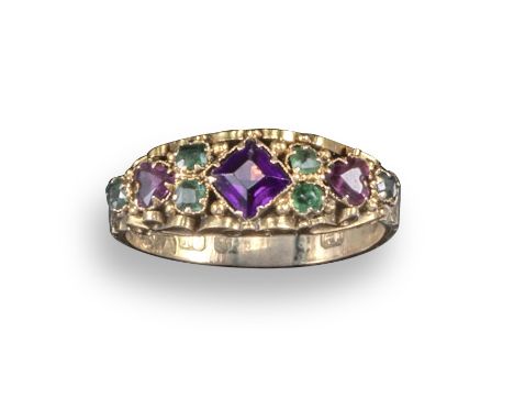 An early 19th century amethyst and emerald ring, set in yellow gold scrolling mount, engraved shank, Birmingham hallmarks for