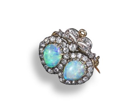 A late Victorian opal and diamond brooch pendant, formed from two conjoined pear-shaped clusters set with cabochon opals and 