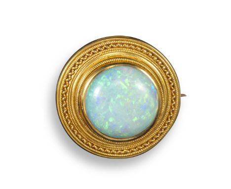 A Victorian Etruscan Revival gold brooch, set with a round solid white opal cabochon within ropetwist yellow gold border, 2.7