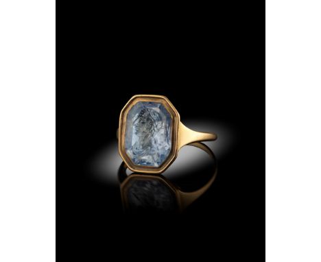 A Renaissance carved sapphire intaglio, depicting Julius Caesar, the octagonal sapphire 1.5cm high, mounted in a later gold r