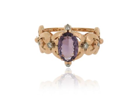 An amethsyt and diamond-set gold bangle, set with a large oval-shaped amethyst and six graduated diamonds in yellow gold, 5.5