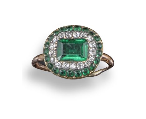 A George III emerald and diamond cluster ring, set with an emerald-cut emerald within a diamond and emerald border in closed-