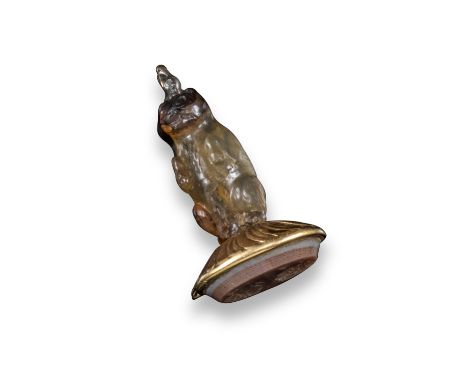 A late 18th century carved hardstone cat fob seal, with gold-mounted carved agate intaglio depicting a man and a woman with d