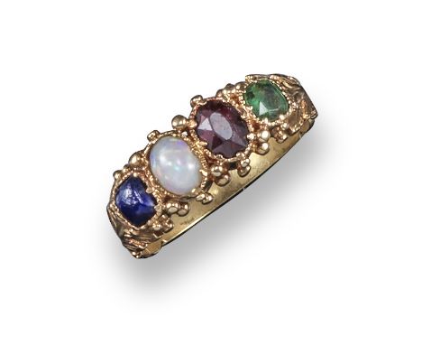 A 19th century acrostic ring, set with four gemstones spelling the word LOVE in lapis lazuli, opal, garnet and emerald in yel