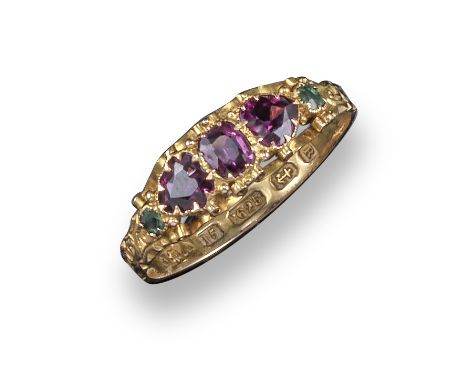 A garnet and emerald half-hoop ring, set in yellow gold scroll mount with engraved decoration to shank in 15ct yellow gold, B