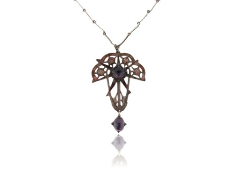 An Arts &amp; Crafts silver pendant by Ella Naper, of openwork foliate design with engraved decoration and purple enamel and 