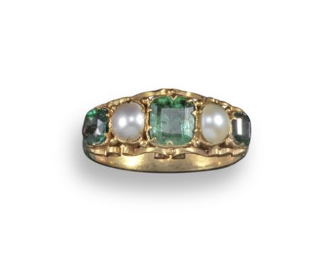 An early 19th century emerald and pearl five stone ring, set in gold scrolling mount, size M