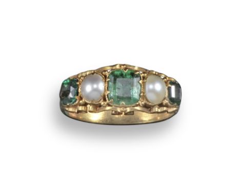 An early 19th century emerald and pearl five stone ring, set in gold scrolling mount, size M