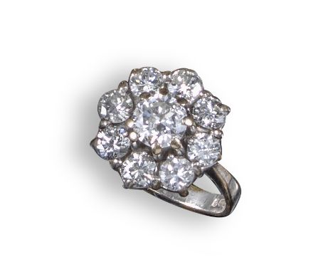 A diamond cluster ring, set with graduated round brilliant-cut diamonds in white gold, size I