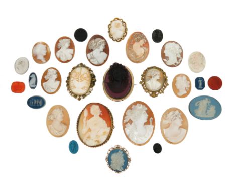 A group of cameos, including fifteen shell cameos, a glass cameo ring, a purple glass cameo brooch, three Wedgwood cameos, a 