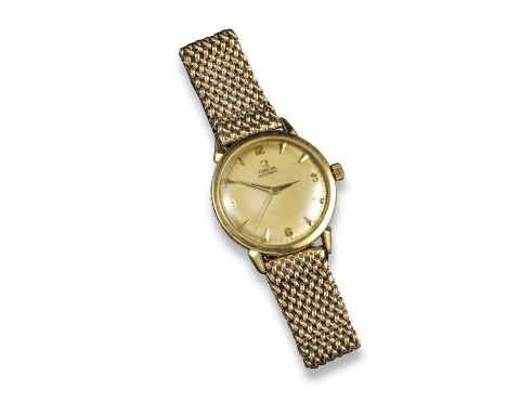 A gentleman's gold Omega wristwatch, the signed dial with Arabic and baton numerals, sweep seconds hand, automatic movement, 