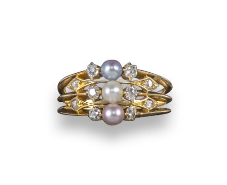 An Edwardian pearl and diamond Harem ring, centred with a pink, white and grey seed pearl between cushion-shaped diamonds, wi