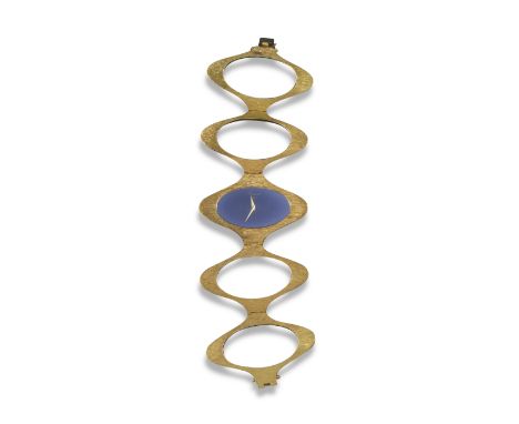 A lady's abstract gold wristwatch by Chopard c1970, the signed lapis lazuli dial set within textured gold lozenge-shaped case