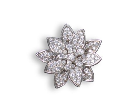 A diamond set flower head ring, the petals pave-set with circular-cut diamonds in white gold, size P