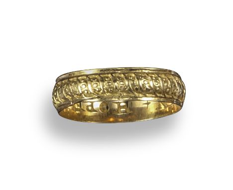 An 18th century gold posy ring, engraved to the interior with the inscription 'IN + HOPE + I + REST+' with engraved decoratio