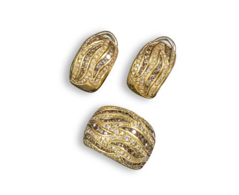 A matching yellow gold bombé ring and earrings by Damiani, all set with scrolls of white and brown circular-cut diamonds, rin