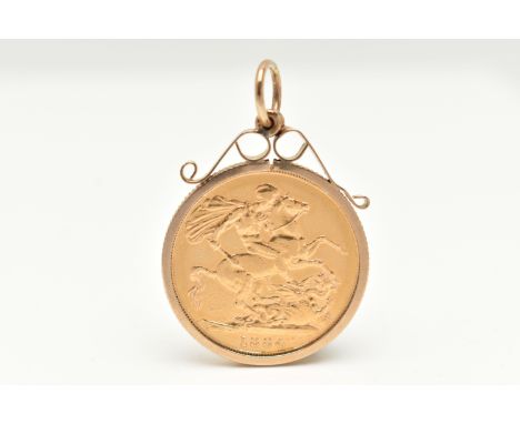 A VICTORIAN FULL GOLD SOVEREIGN COIN PENDANT, sovereign depicting Queen Victoria, dated 1884, within a yellow metal milled mo